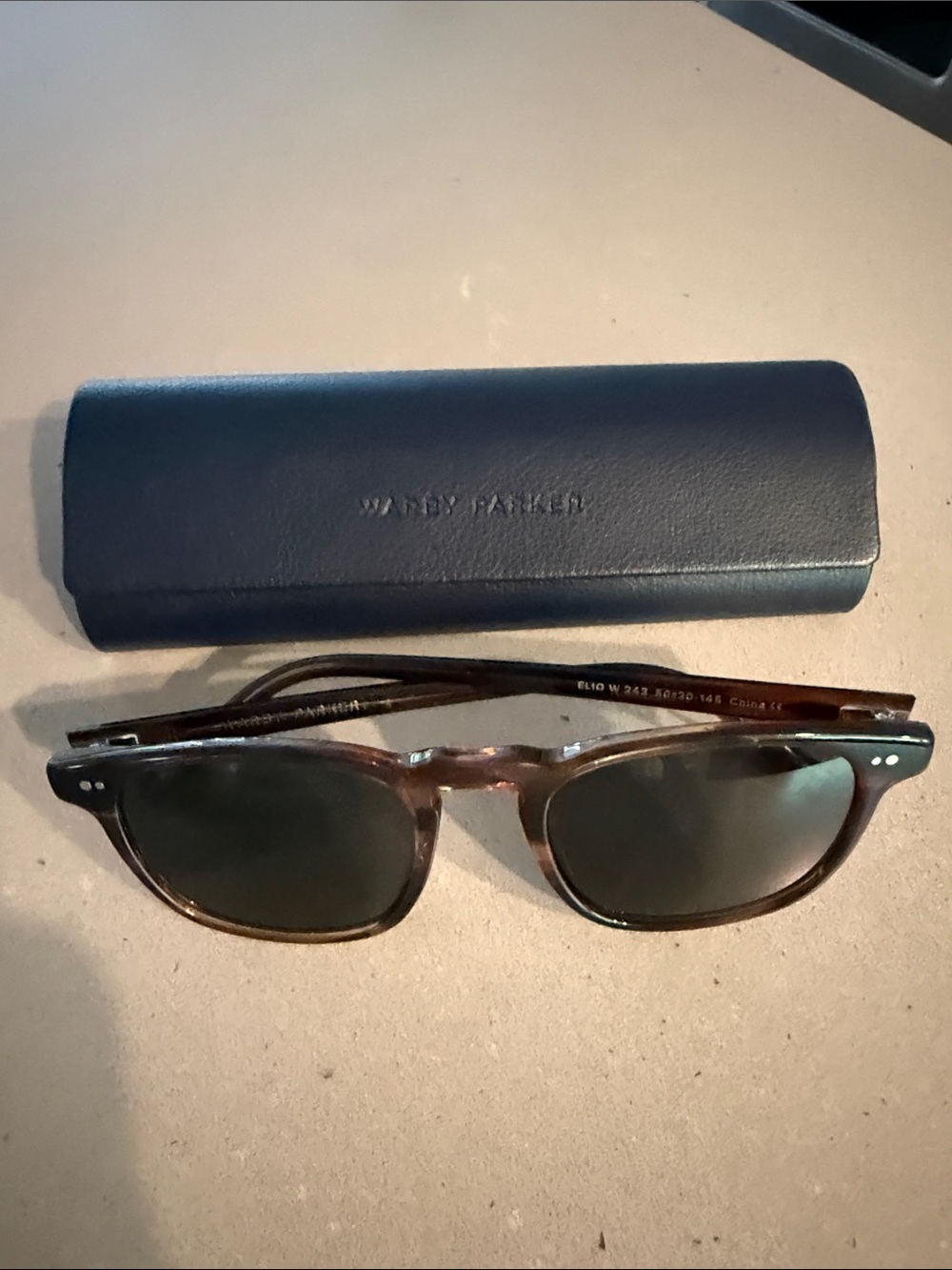 Warby Parker Sunglasses in Tortoiseshell with Green Lenses